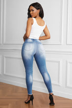 Load image into Gallery viewer, Faded Mid High Rise Jeans
